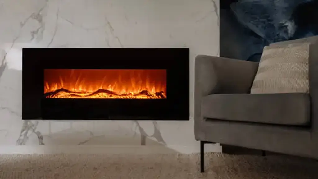 Living room with Wall Mounted Fireplaceand chair against marble wall