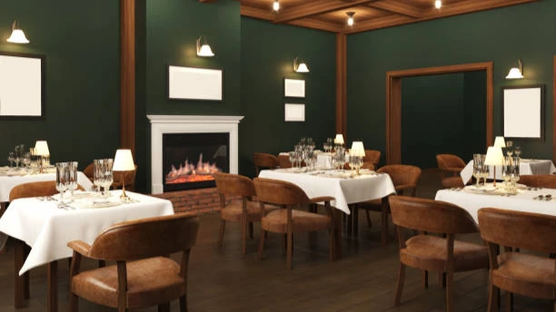 A la carte restaurant dining room featuring an electric fireplace